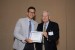 Dr. C. Dale Zinn, IMSCI 2012 Program Committee Chair, giving Dr. L. Velázquez-Araque the best paper award certificate of the session "Engineering Concepts, Relations and Methodologies I." The title of the awarded paper is "Computational Simulation of the Flow Past an Airfoil for an Unmanned Aerial Vehicle."